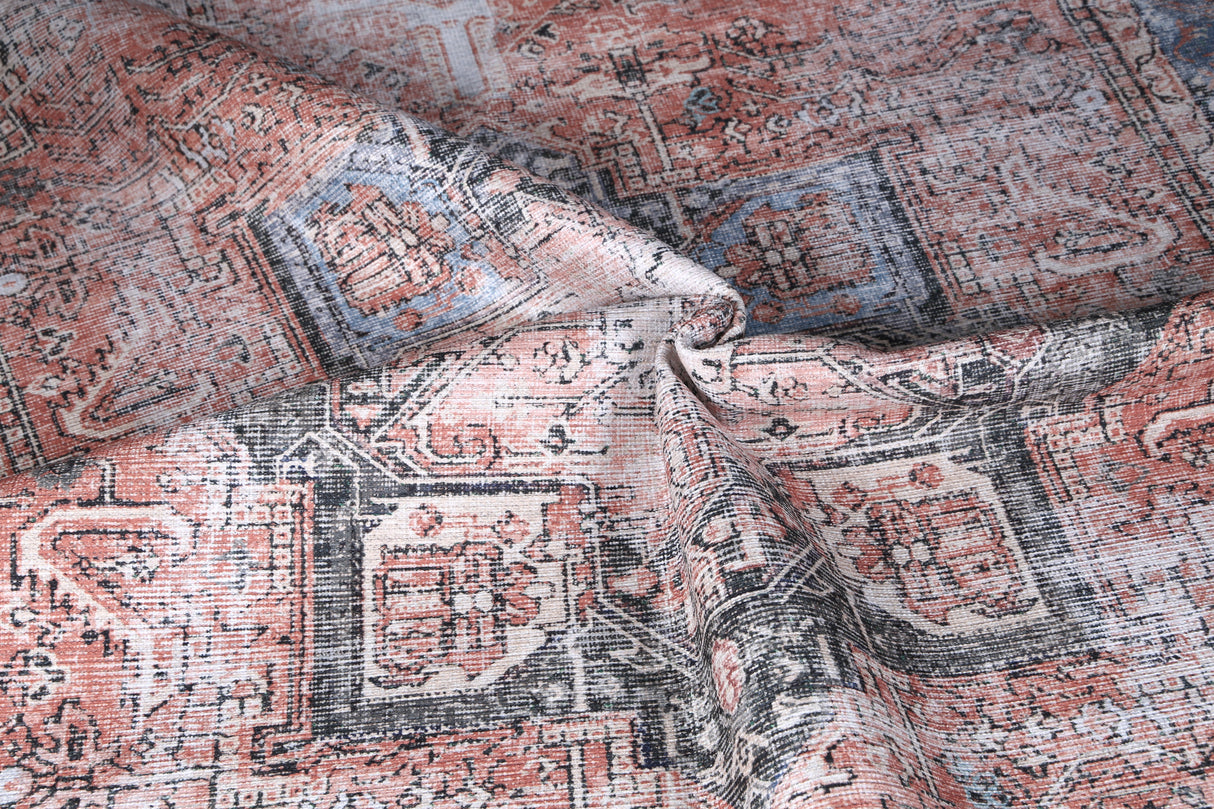 Close-up of a patterned fabric with intricate designs.